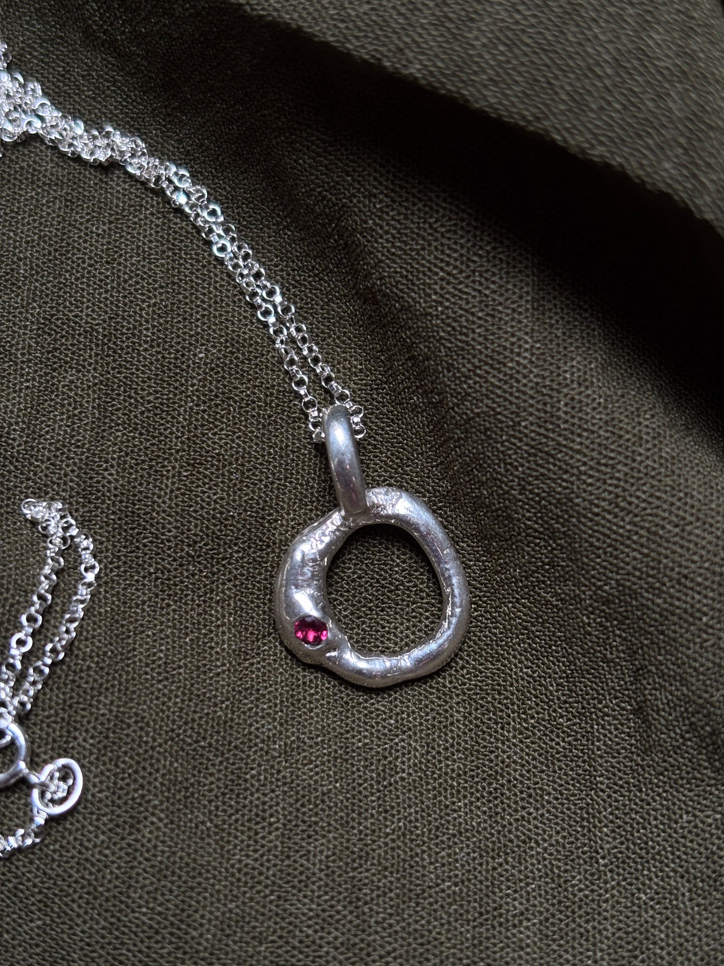 Molten pendant with garnet