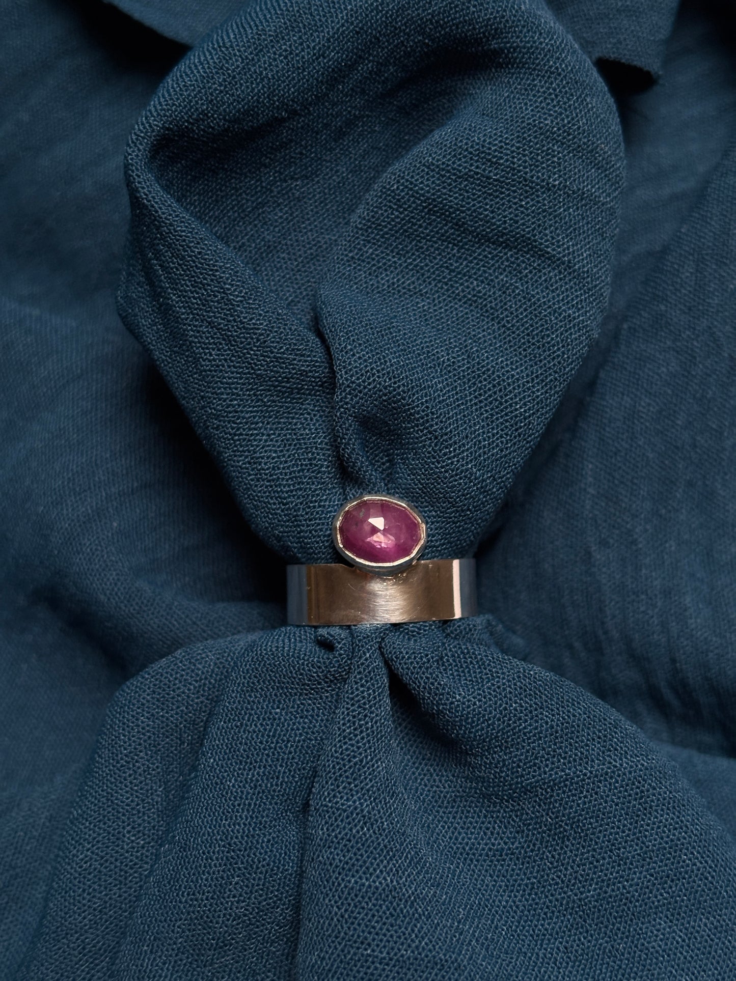 Off-set ruby ring